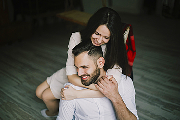 Caucasian couple hugging