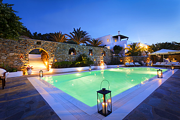 Illuminated swimming pool at night