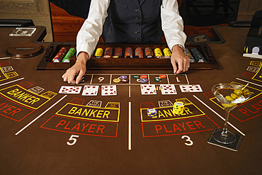 Dealer at baccarat table