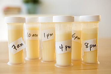 Vials of breast milk with time