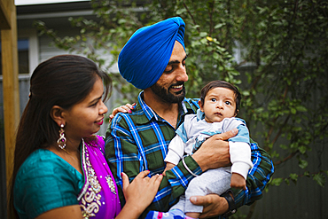 Couple admiring baby son