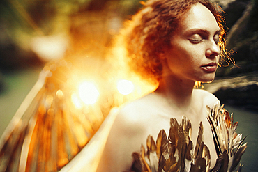 Caucasian woman with angel wings