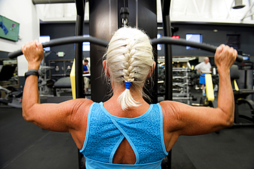 Older woman working out in gymnasium