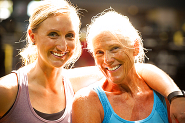 Portrait of smiling women hugging