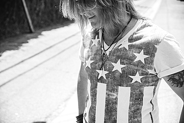 Caucasian man wearing American flag shirt