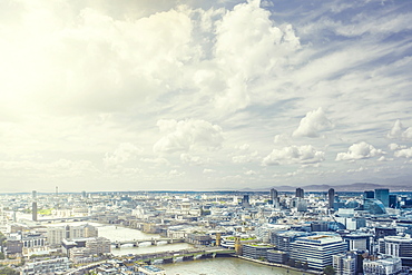 Clouds over river through city, London, England, United Kingdom,