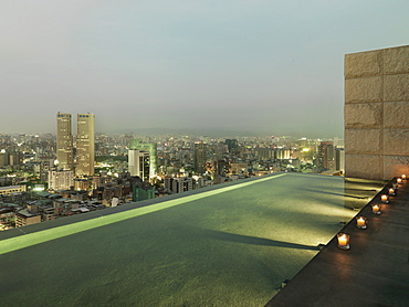 Patio and reflection pool overlooking city