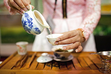 Woman pouring tea