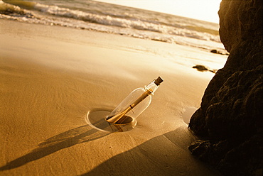 Message in bottle on beach