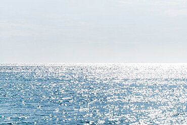 Calm sea surface reflecting sunlight