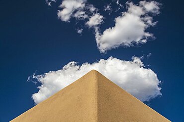 Usa, New Mexico, Santa Fe, Low angle view of clouds over adobe wall