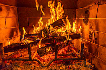 Close-up of fireplace burning wood