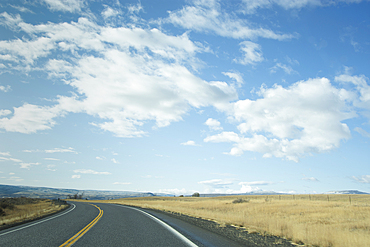 Highway 95 crossing grassy field