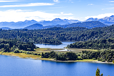 High angle view of mountain lakes and forests on sunny summer day
