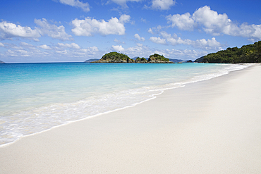 Calm sea waves on empty Trunk Bay Beach