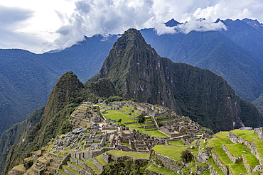 High angle view of Machu Picchu Inca ruins and mountains