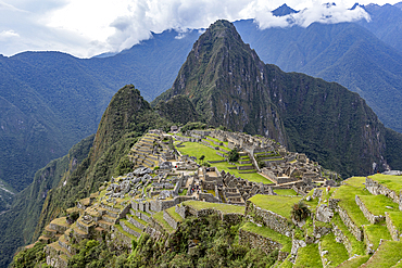 High angle view of Machu Picchu Inca ruins and mountains
