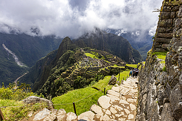 Clouds over Machu Picchu Inca ruins and mountains