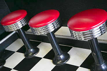 Swivel stools at diner counter