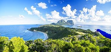 Hand of hiker pointing at Mount Gower and Mount Lidgbird on Lord Howe Island, Lord Howe Island, New South Wales, Australia