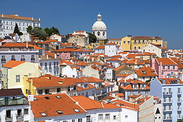 Terracotta roofs and the ancient dome seen from Miradouro Alfama one of the many viewpoints of Lisbon, Portugal, Europe