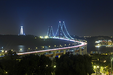 Night view of Ponte 25 de Abril, one of the largest suspension bridges in the world, Lisbon, Portugal, Europe