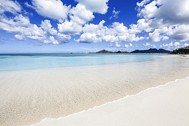 Blue sky frames the white sand and the turquoise Caribbean sea, Ffryes Beach, Antigua, Antigua and Barbuda, Leeward Islands, West Indies, Caribbean, Central America