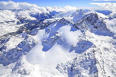 Aerial view of Peak Ferra covered with snow, Spluga Valley, Chiavenna, Valtellina, Lombardy, Italy, Europe