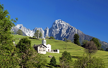 Panoramic view of Pizzo Di Prata and Daloo surrounded by green meadows, Chiavenna Valley, Valtellina, Lombardy, Italy, Europe