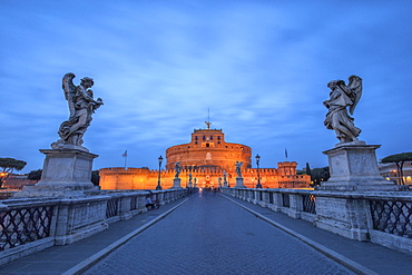 Dusk on the ancient palace of Castel Sant'Angelo with statues of angels on the bridge on Tiber RIver, UNESCO World Heritage Site, Rome, Lazio, Italy, Europe