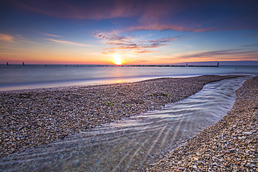 The lights of sunrise reflected in the calm sea, Porto Recanati, Province of Macerata, Conero Riviera, Marche, Italy, Europe