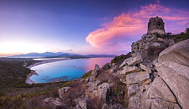 View of the bay and beaches from the stone tower at sunset, Porto Giunco, Villasimius, Province of Cagliari, Sardinia, Italy, Mediterranean, Europe