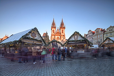 Tourists at the Christmas markets facing the Cathedral of St. Vitus, Old Town Square, Prague, Czech Republic, Europe