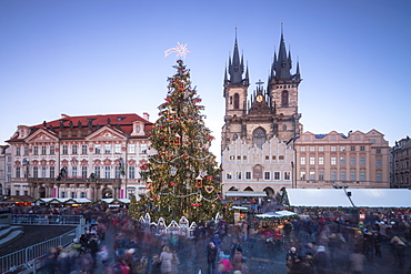 Tourists at the Christmas markets facing the Cathedral of St. Vitus, Old Town Square, UNESCO World Heritage Site, Prague, Czech Republic, Europe