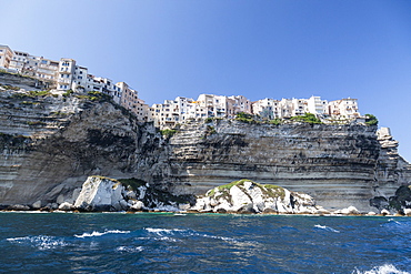 The turquoise sea frames the ancient village perched on the white cliffs, Bonifacio, Corsica, France, Mediterranean, Europe