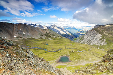 High peaks frame the alpine lakes and meadows, Filon Del Mott, Bormio, Braulio Valley, Stelvio Pass, Valtellina, Lombardy, Italy, Europe