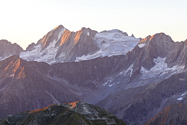 Rocky peak of Cima Presanella seen from Monte Tonale at dawn, Valcamonica, border Lombardy and Trentino-Alto Adige, Italy, Europe