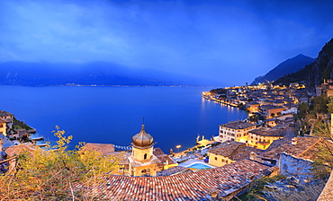 Panorama of Lake Garda and the typical town Limone Sul Garda at dusk, province of Brescia, Italian Lakes, Lombardy, Italy, Europe