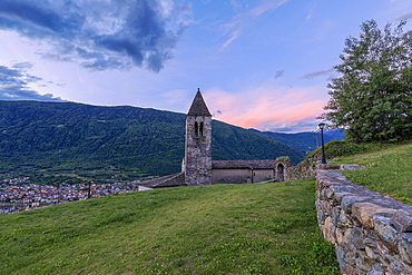 Old bell tower of the Xenodochio of Santa Perpetua at sunrise, Tirano, province of Sondrio, Valtellina, Lombardy, Italy, Europe