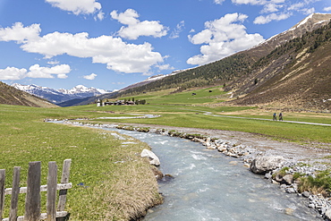 Transparent water of river around the alpine village of Davos, Sertig Valley, canton of Graubunden, Switzerland, Europe