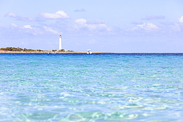 Turquoise sea with lighthouse in the background, San Vito Lo Capo, province of Trapani, Sicily, Italy, Mediterranean, Europe