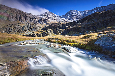 Flowing water of alpine creek, Alpe Fora, Malenco Valley, province of Sondrio, Valtellina, Lombardy, Italy, Europe