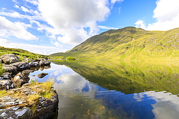 Mountains reflected in water, Killarney National Park, County Kerry, Munster, Republic of Ireland, Europe