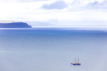 Isolated boat in the ocean during the historical regatta, Torshavn, Streymoy Island, Faroe Islands, Denmark, Europe