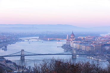 View over the city and River Danube at sunset from The Citadel on Gellert Hill, Budapest, Hungary, Europe