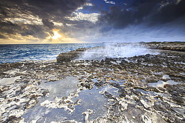 Devil's Bridge, a natural arch carved by the sea from soft and hard limestone ledges of the Antigua formation, St. Johns, Antigua, Leeward Islands, West Indies, Caribbean, Central America