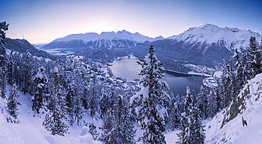 Panoramic of village and Lake of St. Moritz covered with snow, Engadine, Canton of Graubunden, Switzerland, Europe