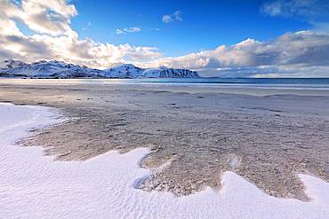 Snow on sandy beach, Ramberg, Flakstad municipality, Lofoten Islands, Nordland, Norway, Europe