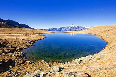 Clear water of lakes of Campagneda with Monte Disgrazia in background, Valmalenco, Valtellina, Sondrio province, Lombardy, Italy, Europe