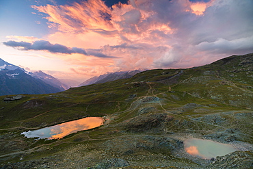 Sunset over the alpine lake of Riffelsee, Zermatt, canton of Valais, Swiss Alps, Switzerland, Europe